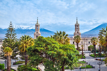 Arequipa, Peru. The main square of the city and a view of the Andes. - 512432331