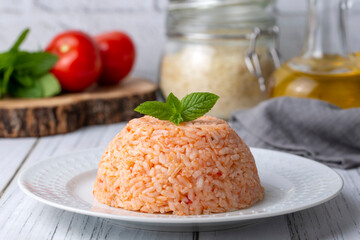 Traditional delicious Turkish food; rice pilaf with tomatoes (Turkish name; Domatesli pirinc pilavi)