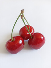 fresh juicy sweet cherry on white background