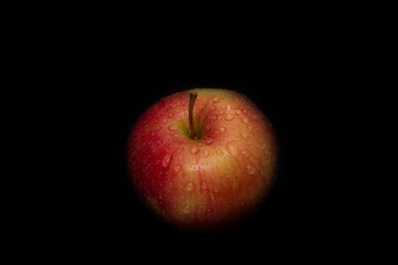 red apple on isolated black background