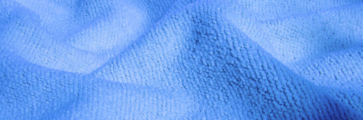 Bright, blue, fluffy, light blanket. Texture textile background