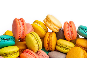 Colorful macaroon cakes. Small french muffins. Colorful macarons on a white background
