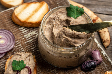 Homemade mushroom and bean paste. Mexican cuisine pate of beans, Pate in glass jar. Tasty sandwich....