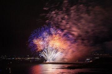 Fireworks over the Barbican Harbour in Plymouth as part of the annual British Firework Championships.