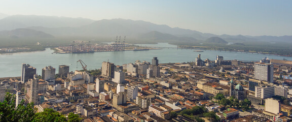 aerial panoramic of Santos city downtown and the port area on background, Brazil