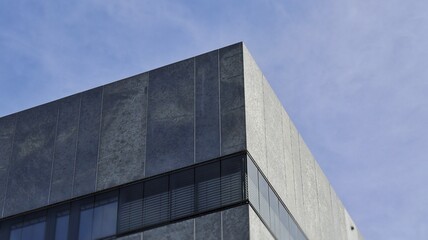 Materialistic and modern building with the sky in the background 