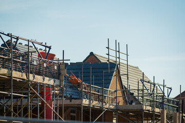 Fototapeta na wymiar new built houses over clear blue sky in england uk