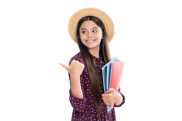 Teen girl pupil hold books, notebooks, isolated on white background, copy space. Back to school, teenage lifestyle, education and knowledge. Portrait of happy smiling teenage child girl.