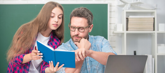 Father and daughter at school, teacher and pupil banner. private teacher and child hold copybook. family help. dad and daughter use notebook.