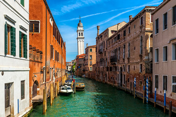 Fototapeta na wymiar Canal and old typical houses in Venice, Italy.