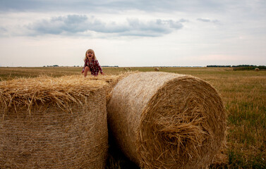 girl on a haystack