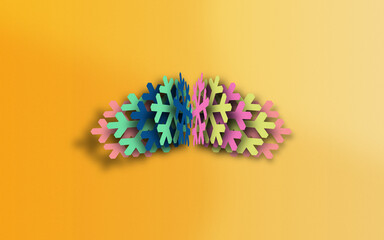 Snowflake Symbol in Multi Colors is Paper Crafted on Paper Yellow Background