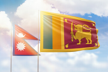 Sunny blue sky and flags of sri lanka and nepal