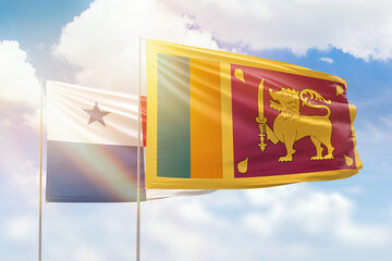 Sunny blue sky and flags of sri lanka and panama