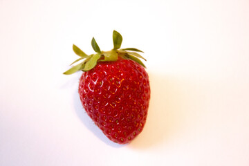 red fresh strawberry on white background