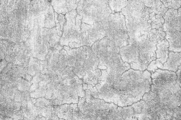 Cracked old concrete plaster wall surface with grunge texture for background