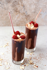 Keto friendly almond chocolate smoothie with raspberries