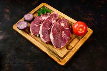 Patagonian lamb meat presented on the wooden table, Patagonia Argentina.