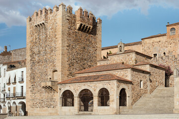 Fototapeta na wymiar Bujaco tower from the 13th century. Cáceres, Spain declared a World Heritage Site by UNESCO in 1986. The new tower located in the main square of Caceres and at the entrance to the old town