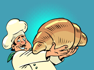 male chef with croissant, morning bakery, french cuisine, delicious bun