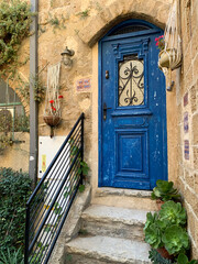 Fototapeta na wymiar Blue door in the old city of Jaffa