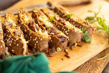 a reuben sandwich stramboli on a cutting board