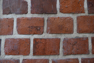 Obraz premium Panoramic view of empty, old, red brick wall background with copy space. Red brick wall texture for background. Brick wall of red color, old red brick wall texture background.