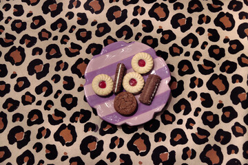 retro fancy biscuits on a patterned plate