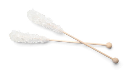 Fototapeta na wymiar Wooden sticks with sugar crystals isolated on white, top view. Tasty rock candies