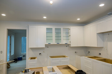 New home in a Installation and assembly of modern kitchen cabinets furniture