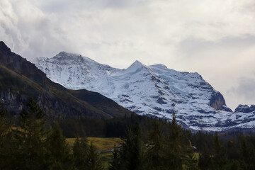 Fototapeta na wymiar View of alp mountain in autumn have snow on top hill