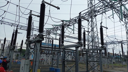 Fototapeta premium a substation is a part of an electrical generation, transmission, and distribution system. Electric Power is the rate, per unit time, at which electrical energy is transferred by an electric circuit. 