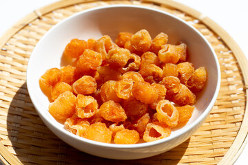 Dried longan on white background.