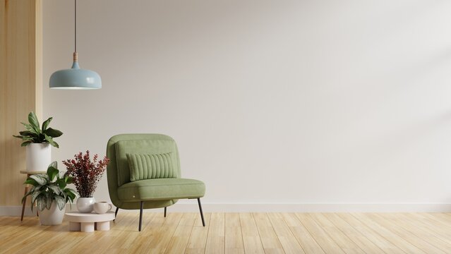 White Minimalist Interior Living Room Has A Green Armchair On Empty White Color Wall Background.