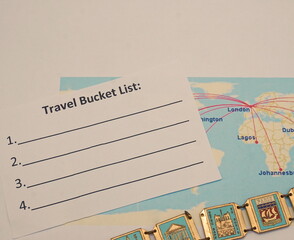 White Travel Bucket List, Partial Map of Airline Routes, Partial View of Souvenir Bracelet from...