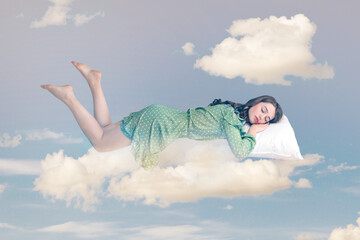 Relaxed girl in ruffle dress levitating in mid-air, sleeping on stomach lying comfortable cozy on...