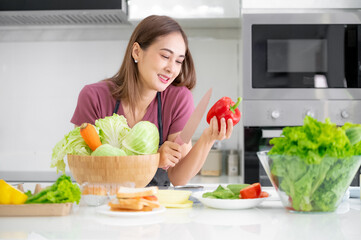 Healthy women cooking salad vegetable eat breakfast