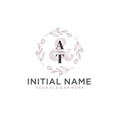 Initial letter AT beauty handwriting logo vector