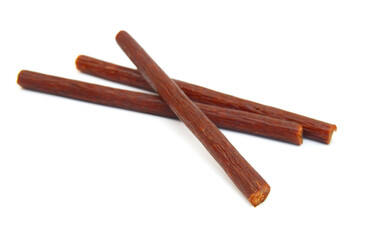 Smoked thin sausages, isolated on white