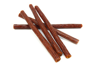 Smoked thin sausages, isolated on white
