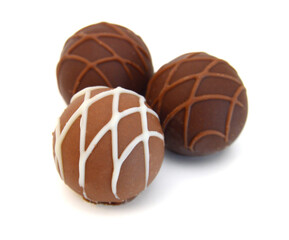 Chocolate candies collection. Beautiful Belgian truffles isolated on white background