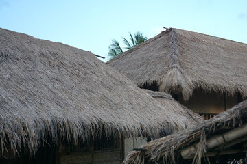Fototapeta na wymiar The roof of a traditional Sasak house made of reeds 