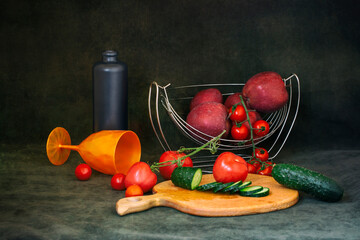 Still life with apples, tomatoes and cucumbers