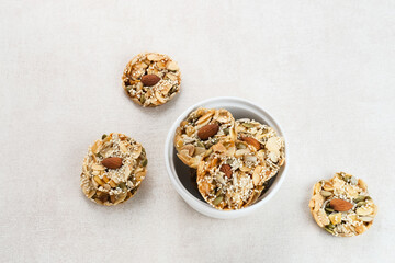 Fototapeta na wymiar Florentine Cookies with mixed nut and dried fruits and seeds. Gluten free. 