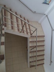 Fototapeta premium top view of the stairs of the house made of tiles. Interior concept.