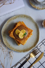 a plate of french toast with jam 