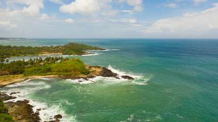 Obraz premium The coast with hotels and beaches and the blue ocean. Sri Lanka.