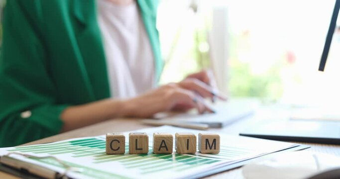 Person prints claim document for client to insurance company on computer