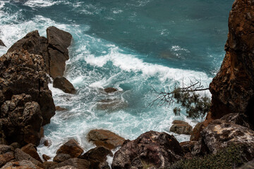 waves crashing on rocks