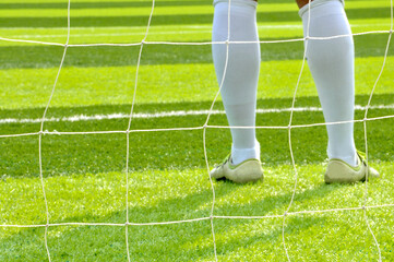 soccer player on the grass